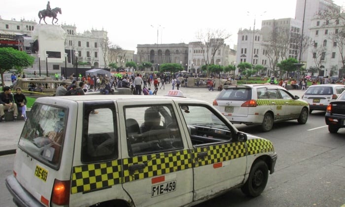 Taxis in Plaza San Martin, Lima.