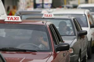 Taxis waiting in traffic 