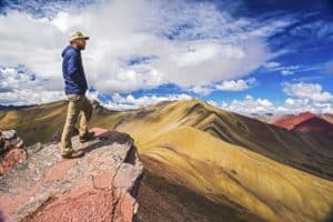 Rainbow Mountain Peru - Man overseeing rainbow mountain