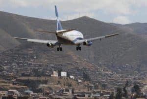 cusco airport guide - plane landing at cusco airport