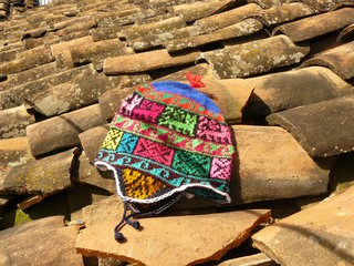 Top peruvian souvenirs - chullo hat with earflaps that has incan patterns on it