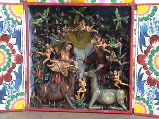 top peruvian souvenirs - a portable box with religious figures in it