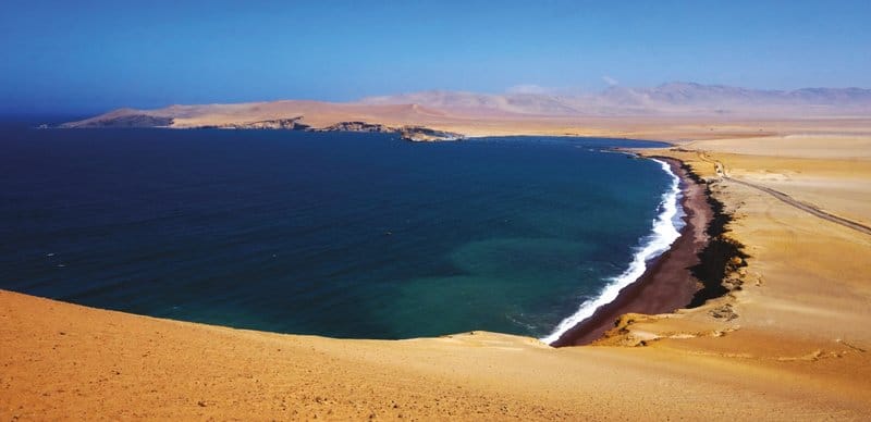 ATV riding Paracas dune buggy tour stop at Paracas National Reserve Red Beach