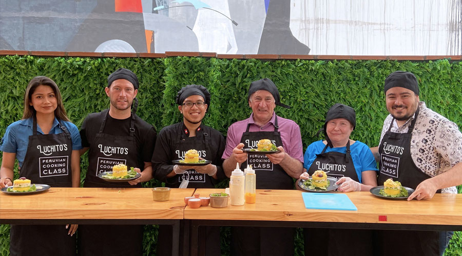 Group showing the food they made after Luchito's Cooking Class